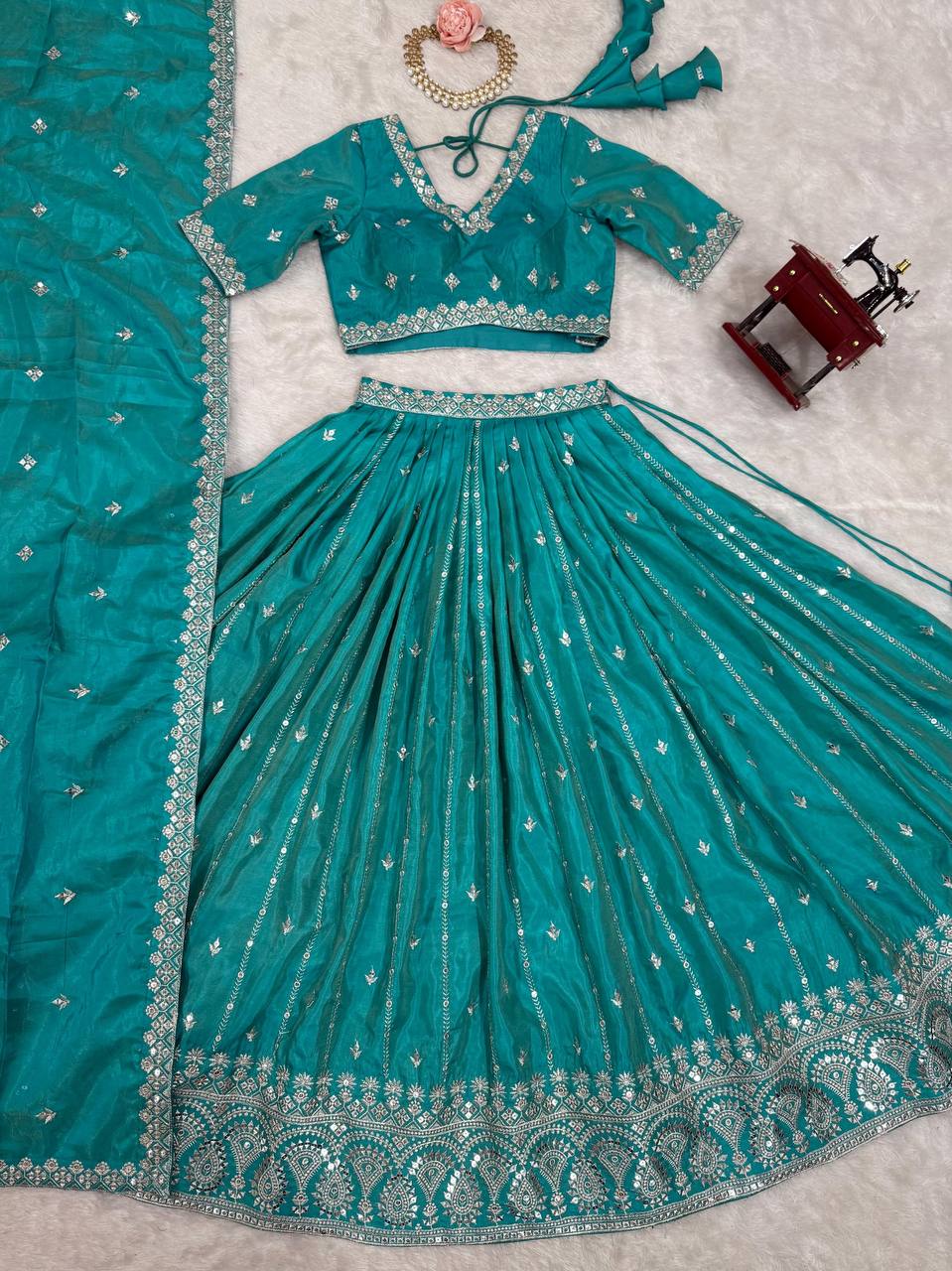 Traditional Wear Sequence Work Rama Color Lehenga Choli