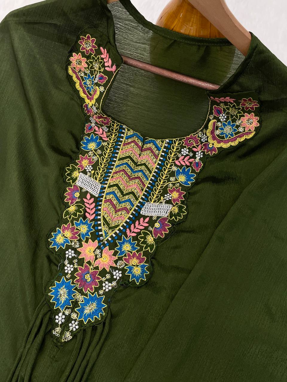 Demanding Embroidery Work Mehndi Color Top With Palazzo Suit