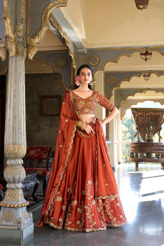 Imposing Heavy Rangoli Silk Orange Color Lehenga Choli