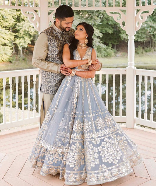 Exquisite Jari And Paper Mirror Embroidered Sky Blue Lehenga