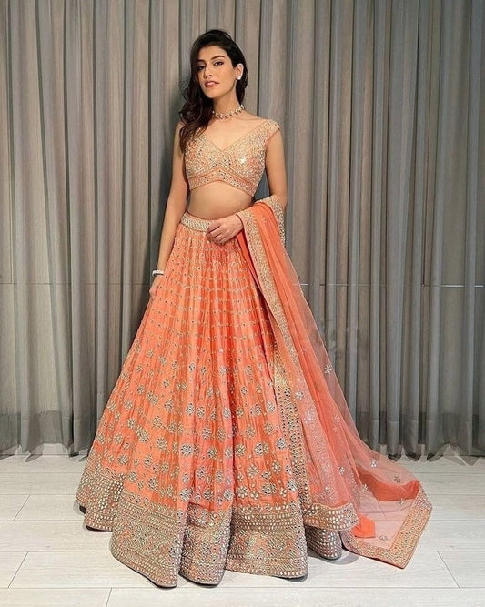 Embroidered Art Silk Lehenga in Orange