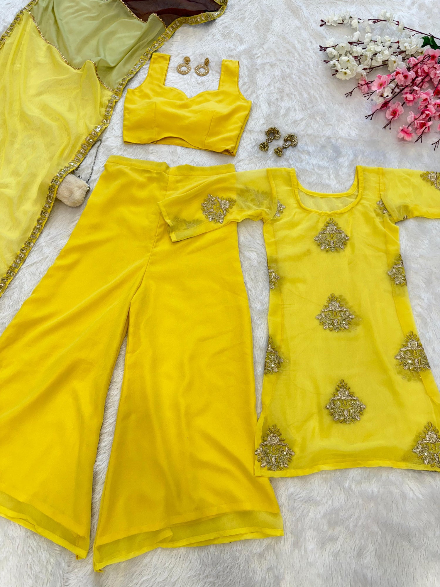 Georgette Haldi Wear Yellow Color Palazzo Suit