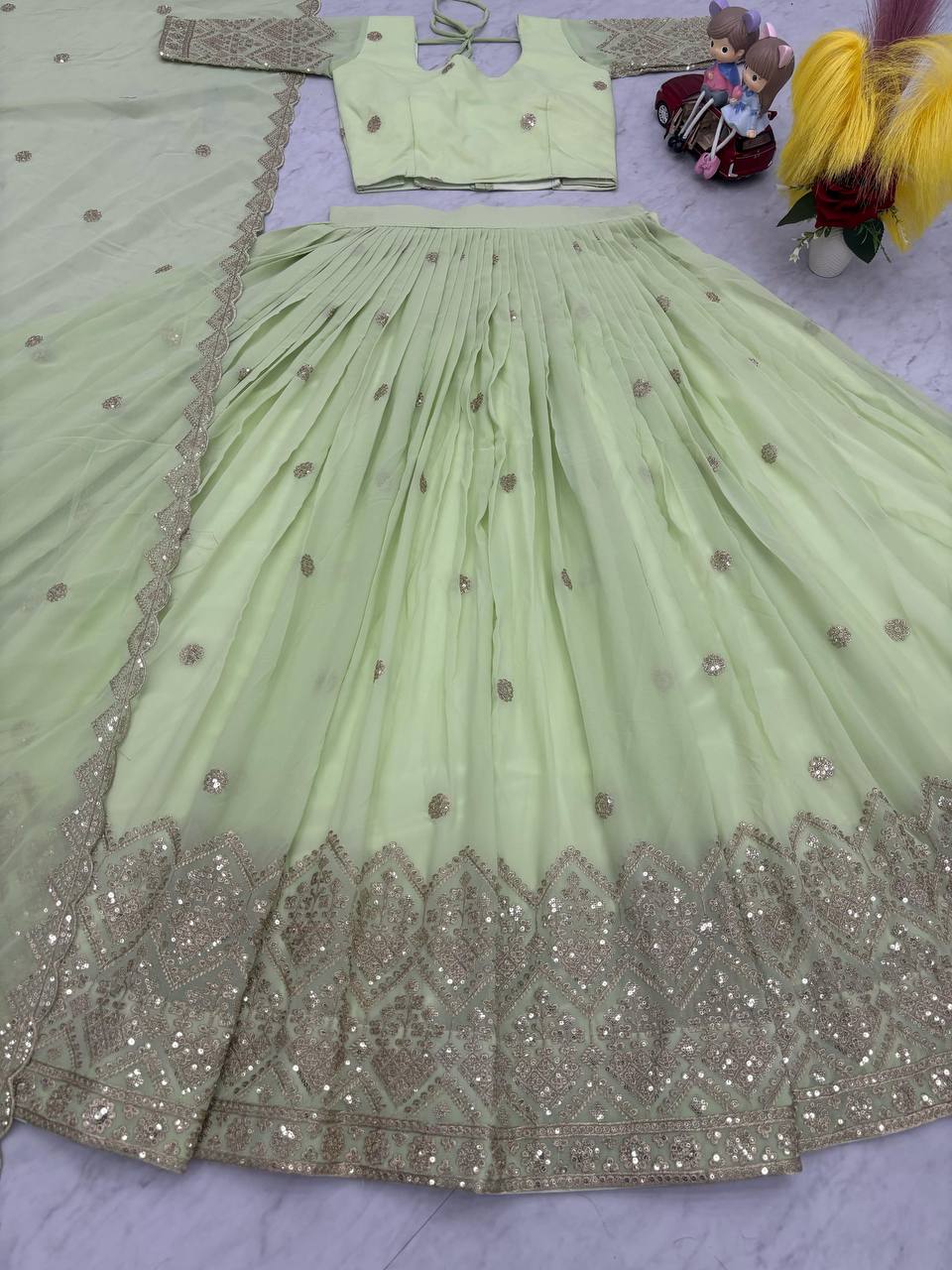 Attractive Sequence Work Perrot Color lehenga choli
