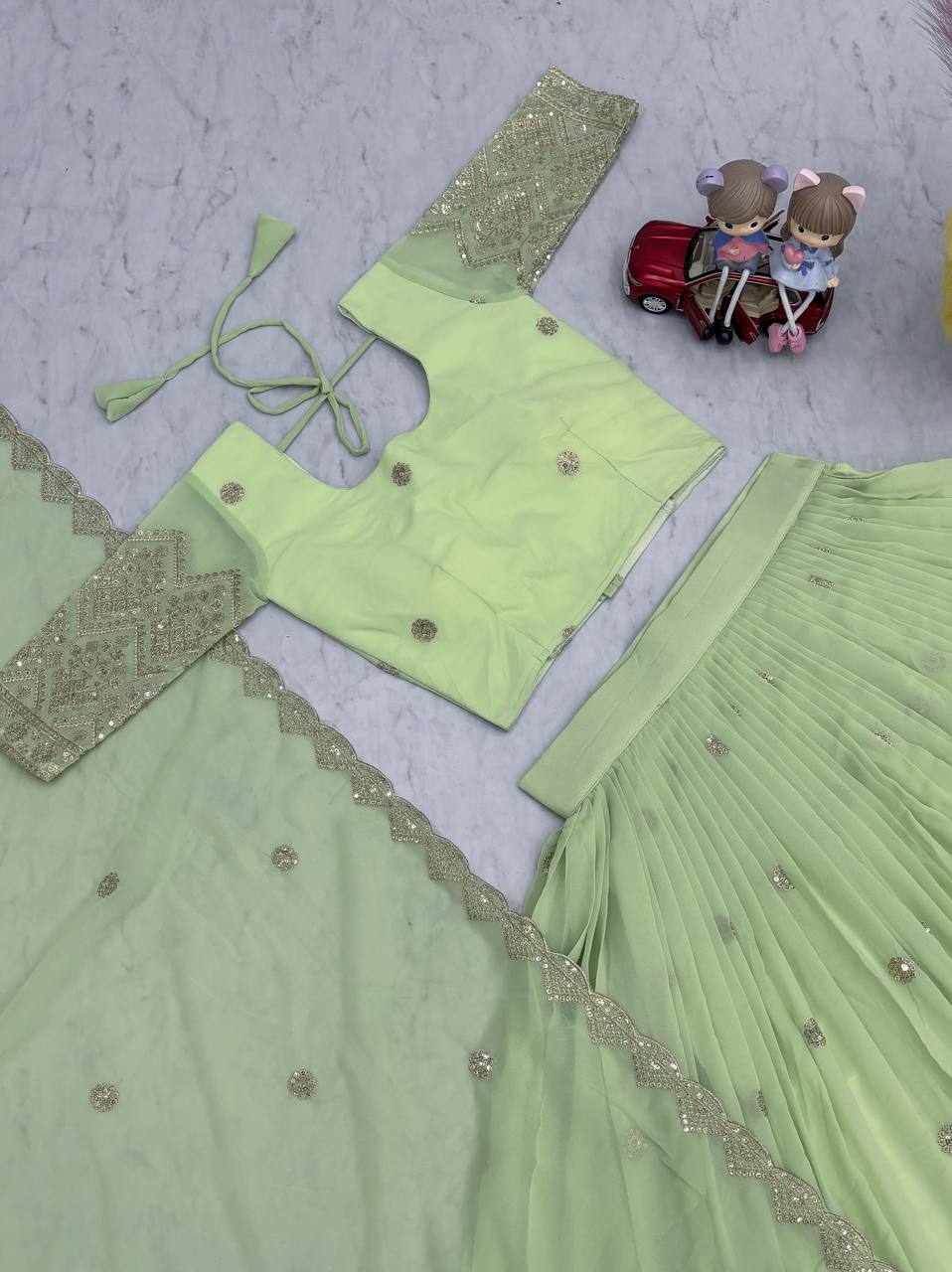 Attractive Sequence Work Perrot Color lehenga choli