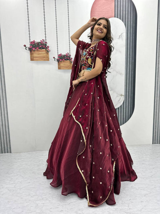 Fancy Embroidery Work Maroon Color Lehenga Choli With Strug