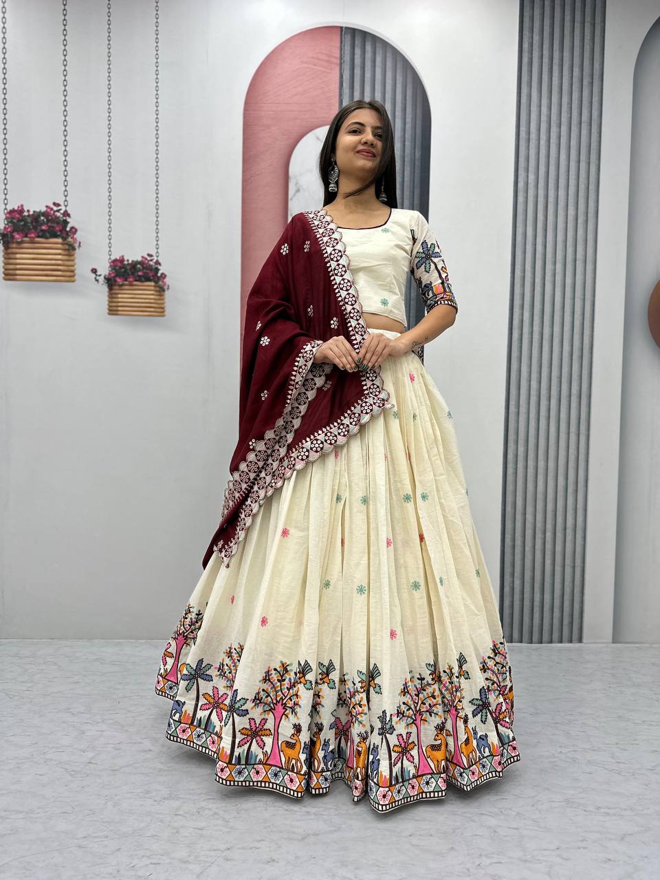 Delightful Embroidery Work Cream Color Lehenga With Maroon Dupatta