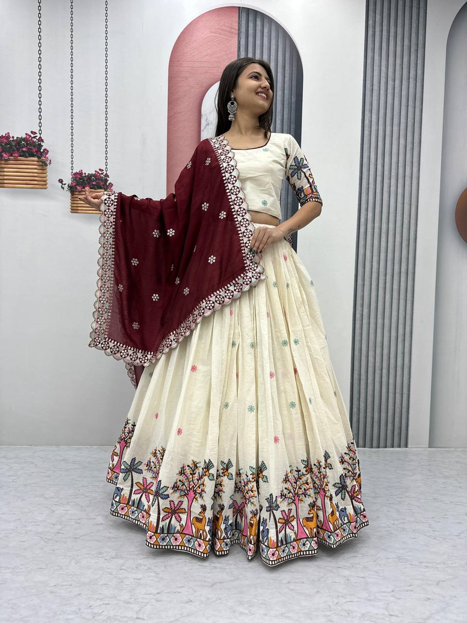Delightful Embroidery Work Cream Color Lehenga With Maroon Dupatta