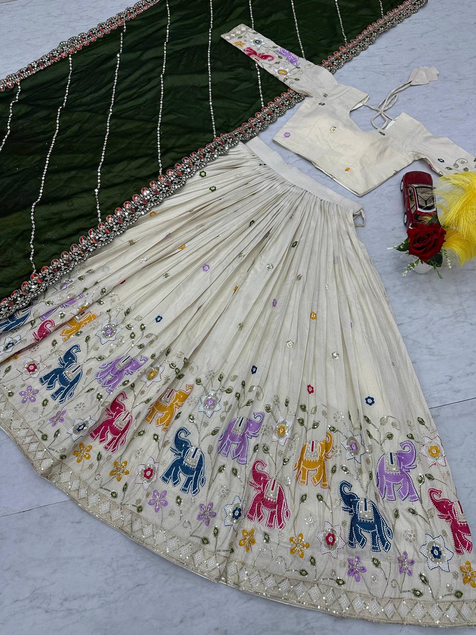 Stunning Off White Color Lehenga choli With Mehndi Dupatta