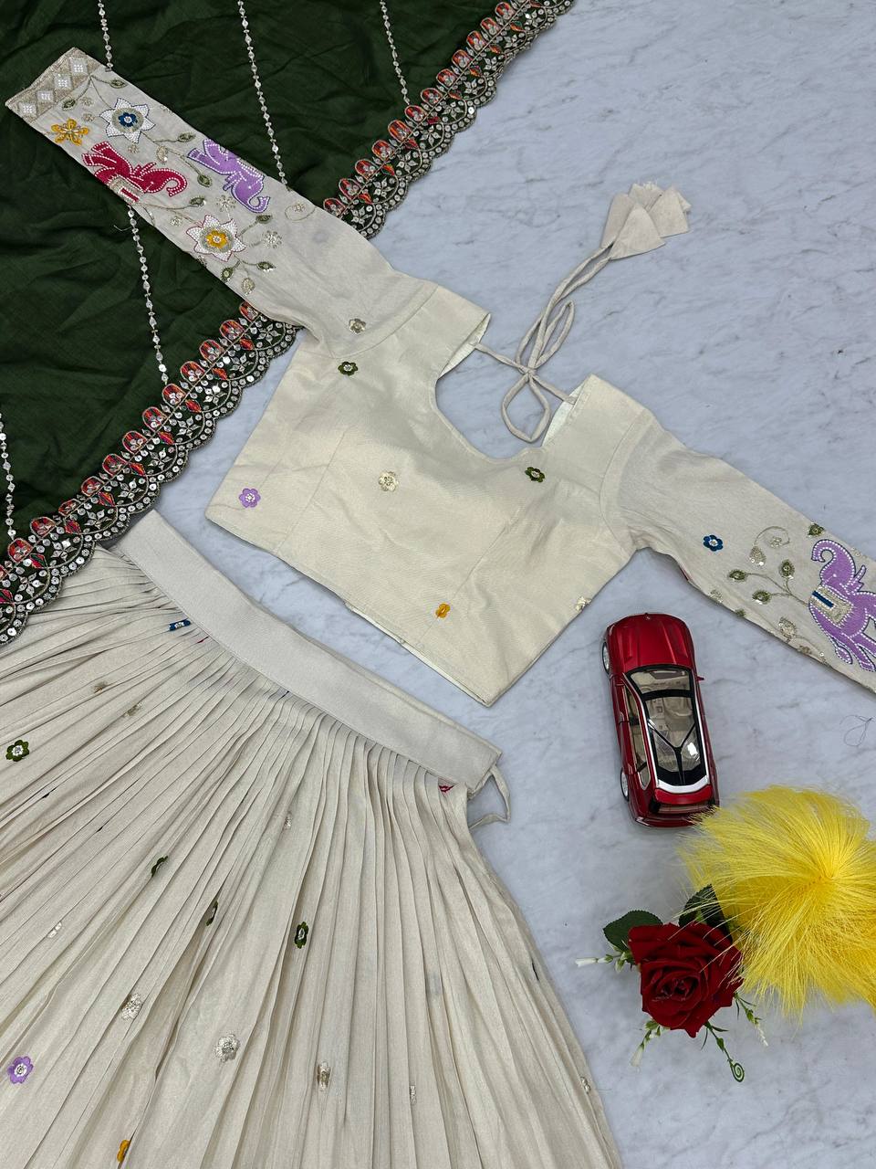 Stunning Off White Color Lehenga choli With Mehndi Dupatta